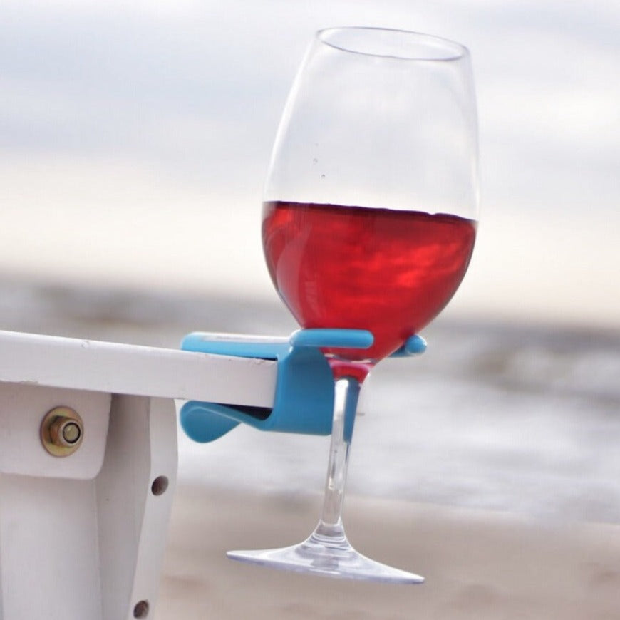 Blue affordable wine holder on a white chair next to the beach