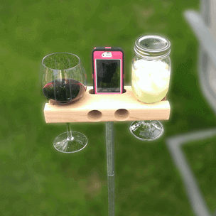 smartphone holder with wine glass holder attached.  also includes built in speaker